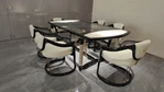 Marble-End Dining Table with Dark Glossy Center and Woven Leather-Wrapped Legs